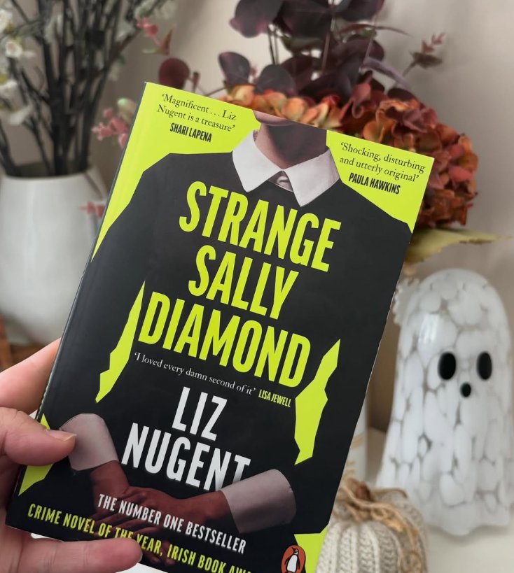 Fliss holding her copy of Strange Sally Diamond by Liz Nugent